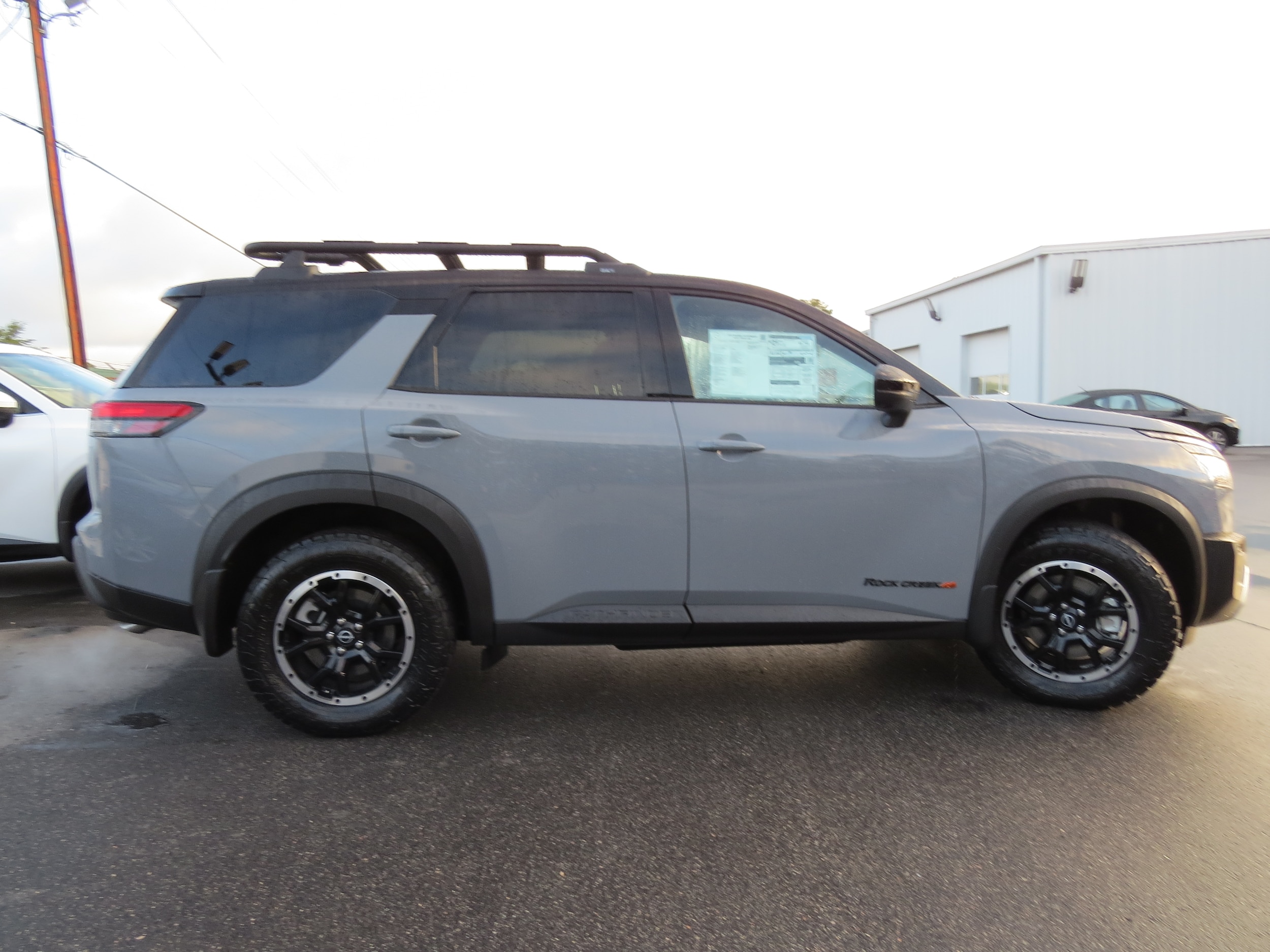 2025 Nissan Pathfinder Rock Creek Two-Tone Boulder Gray Pearl   Super Black at Griffin Nissan