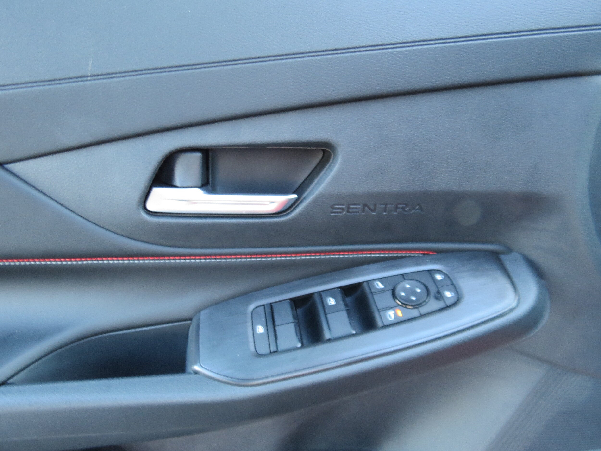 2026 Nissan Sentra SR Energetic Ember/Super Black at Griffin Nissan