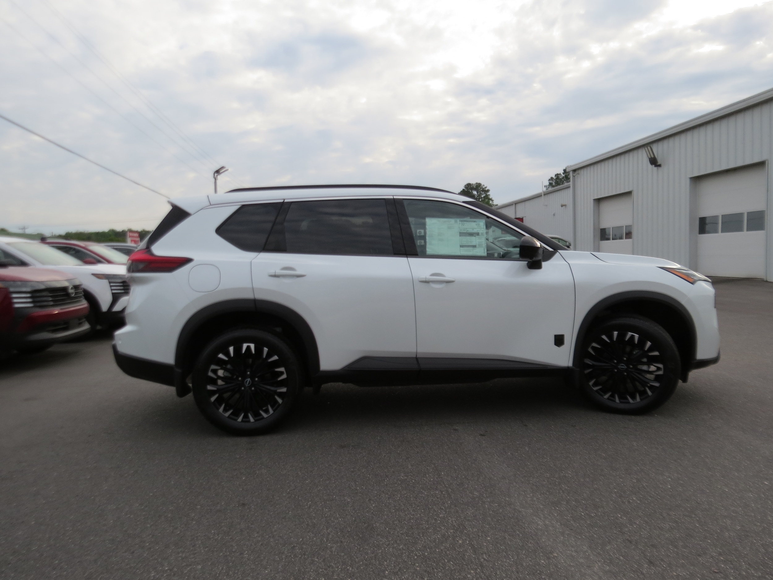 2026 Nissan Rogue Dark Armor Everest White Pearl Tricoat at Griffin Nissan