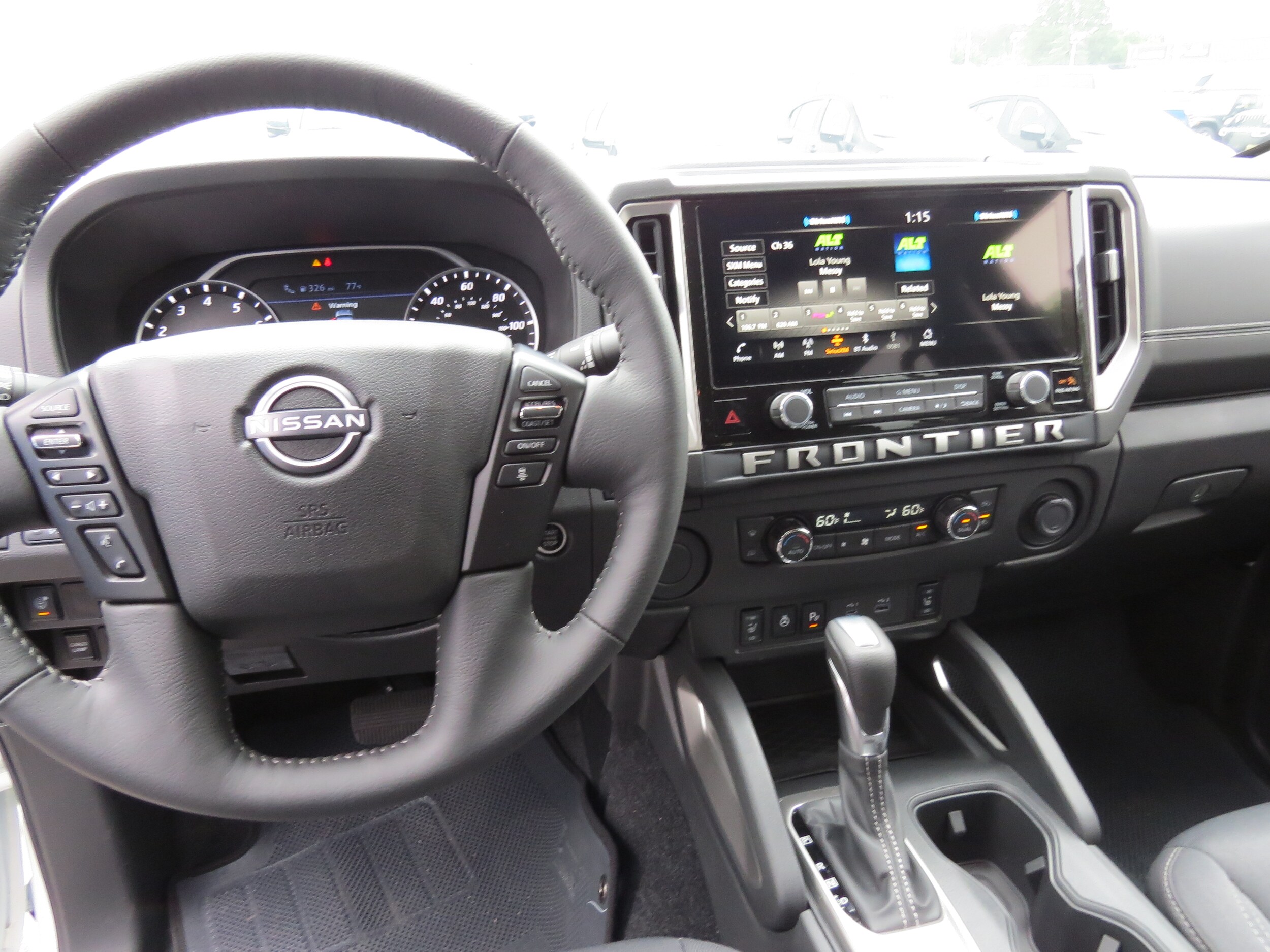 2025 Nissan Frontier SV Glacier White at Griffin Nissan