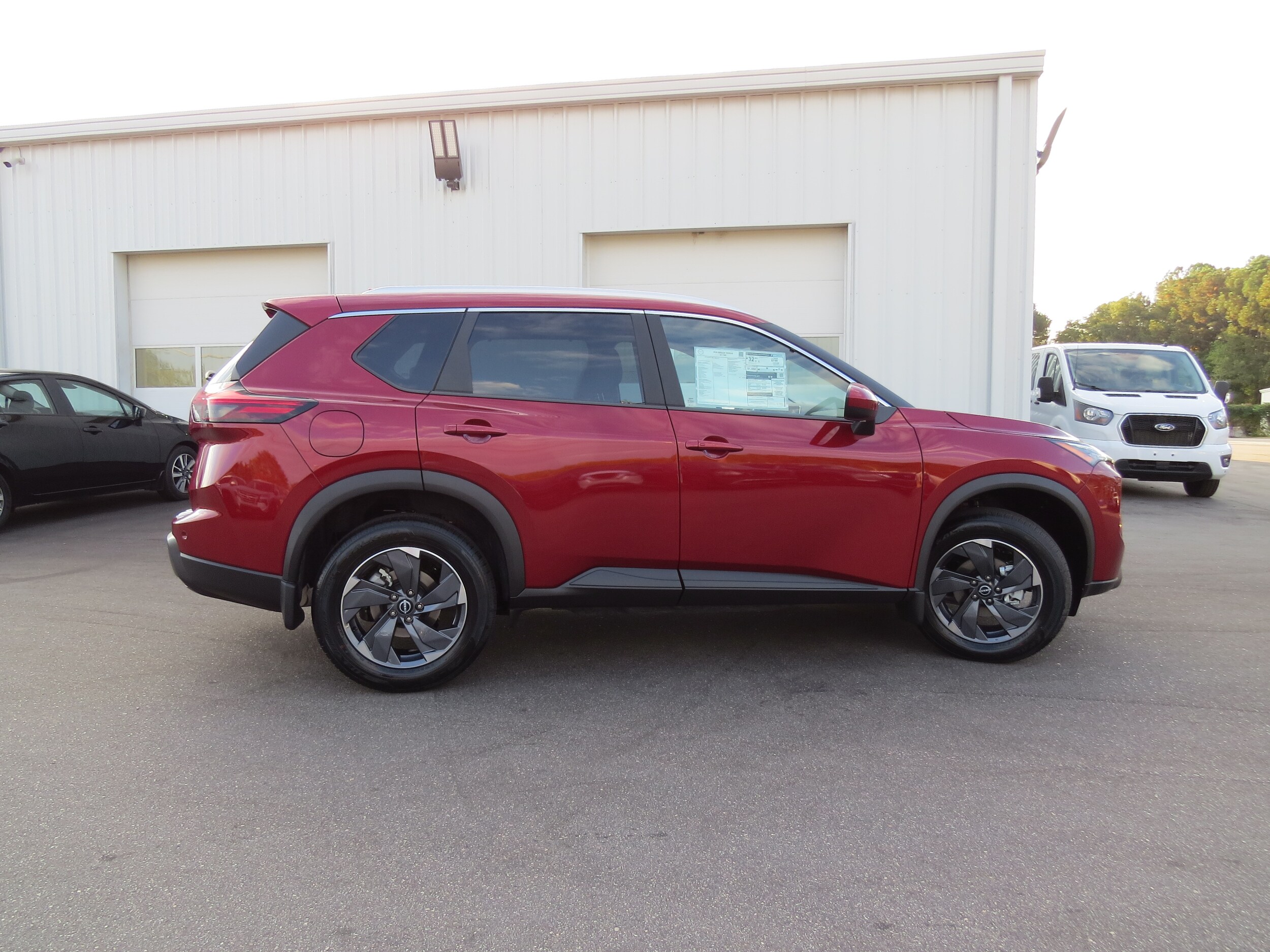 2026 Nissan Rogue SV Scarlet Ember Tintcoat at Griffin Nissan
