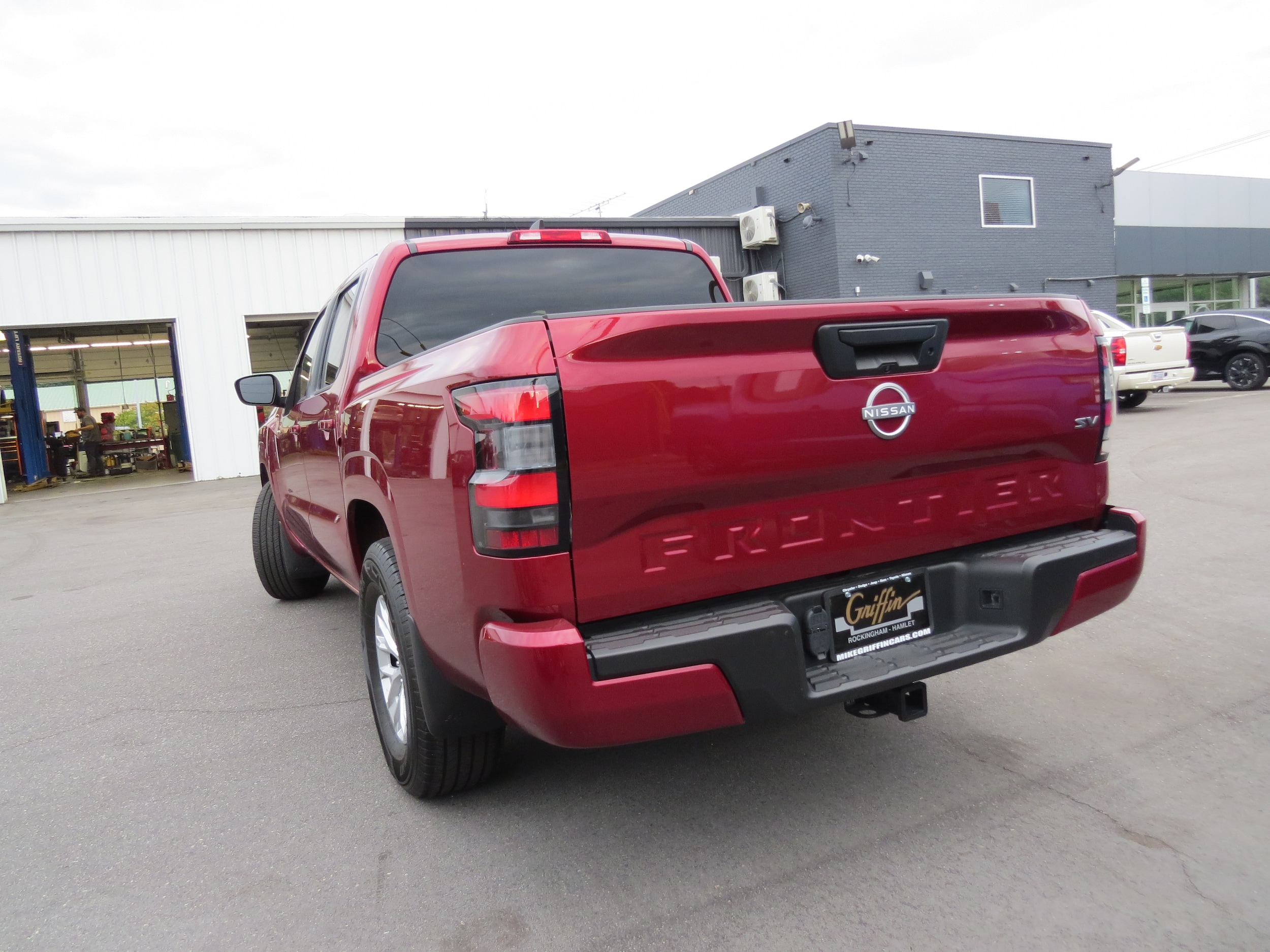 2024 Nissan Frontier SV Cardinal Red Metallic Tricoat at Griffin Nissan