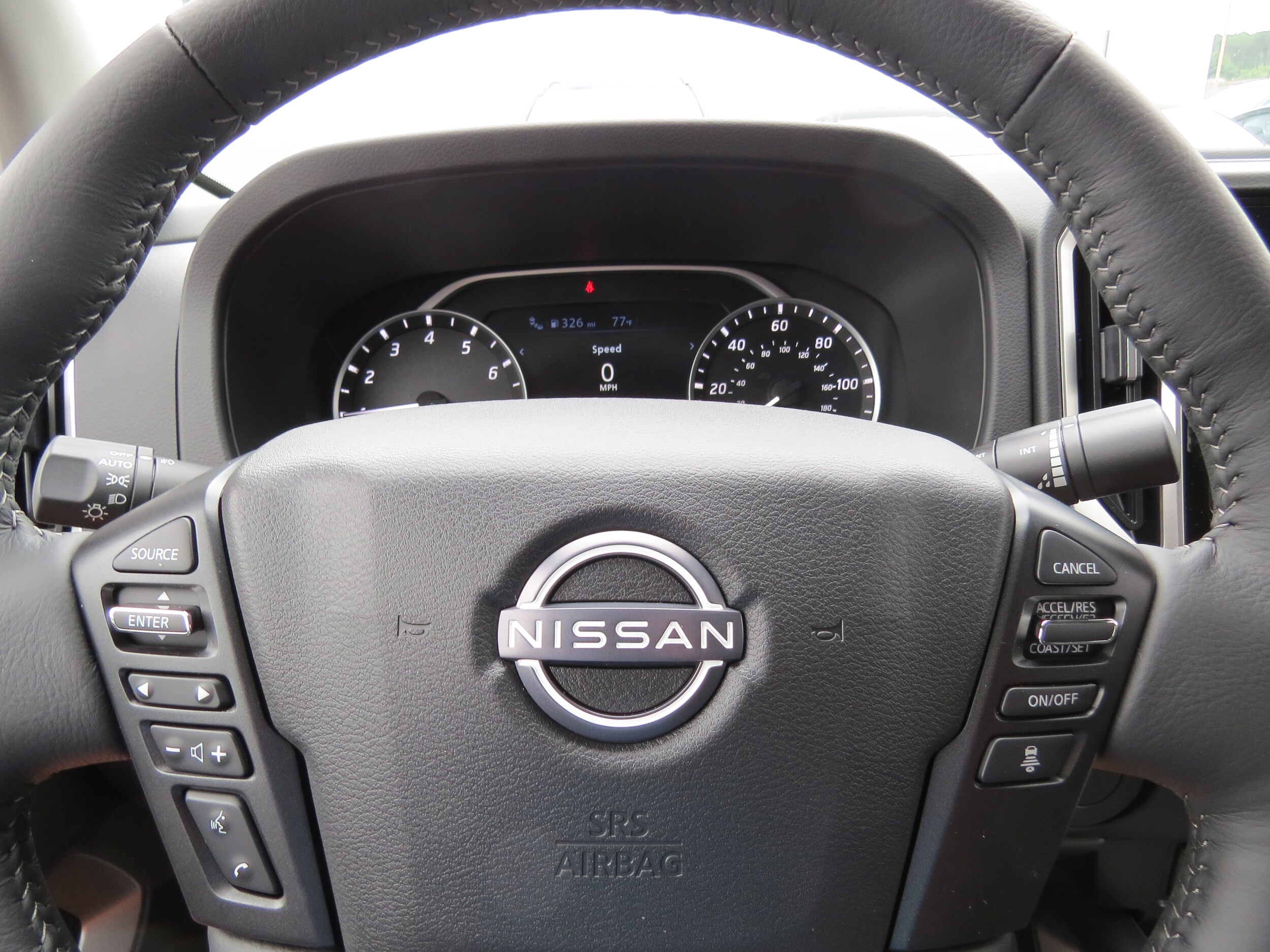 2025 Nissan Frontier SV Glacier White at Griffin Nissan