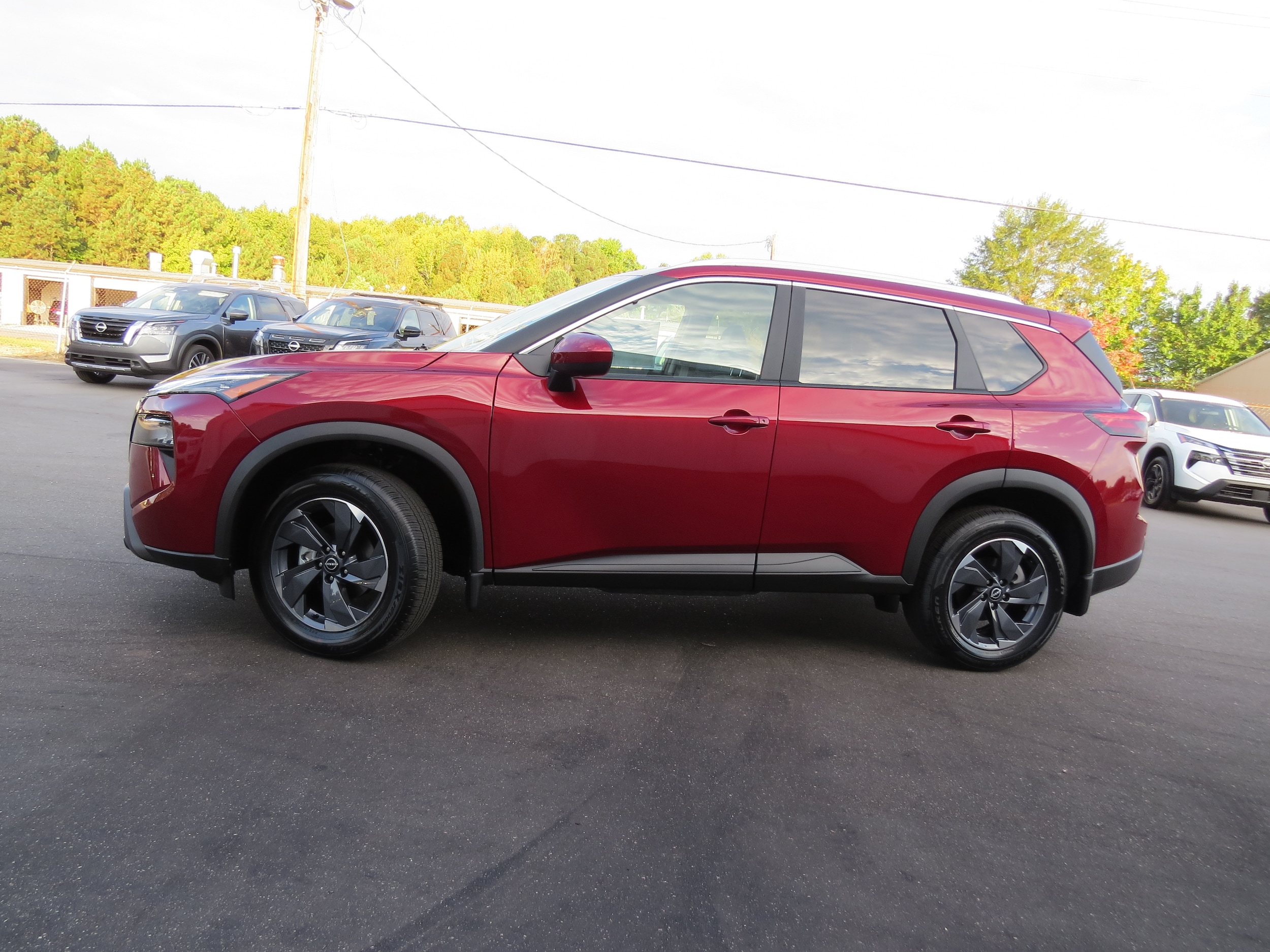 2026 Nissan Rogue SV Scarlet Ember Tintcoat at Griffin Nissan