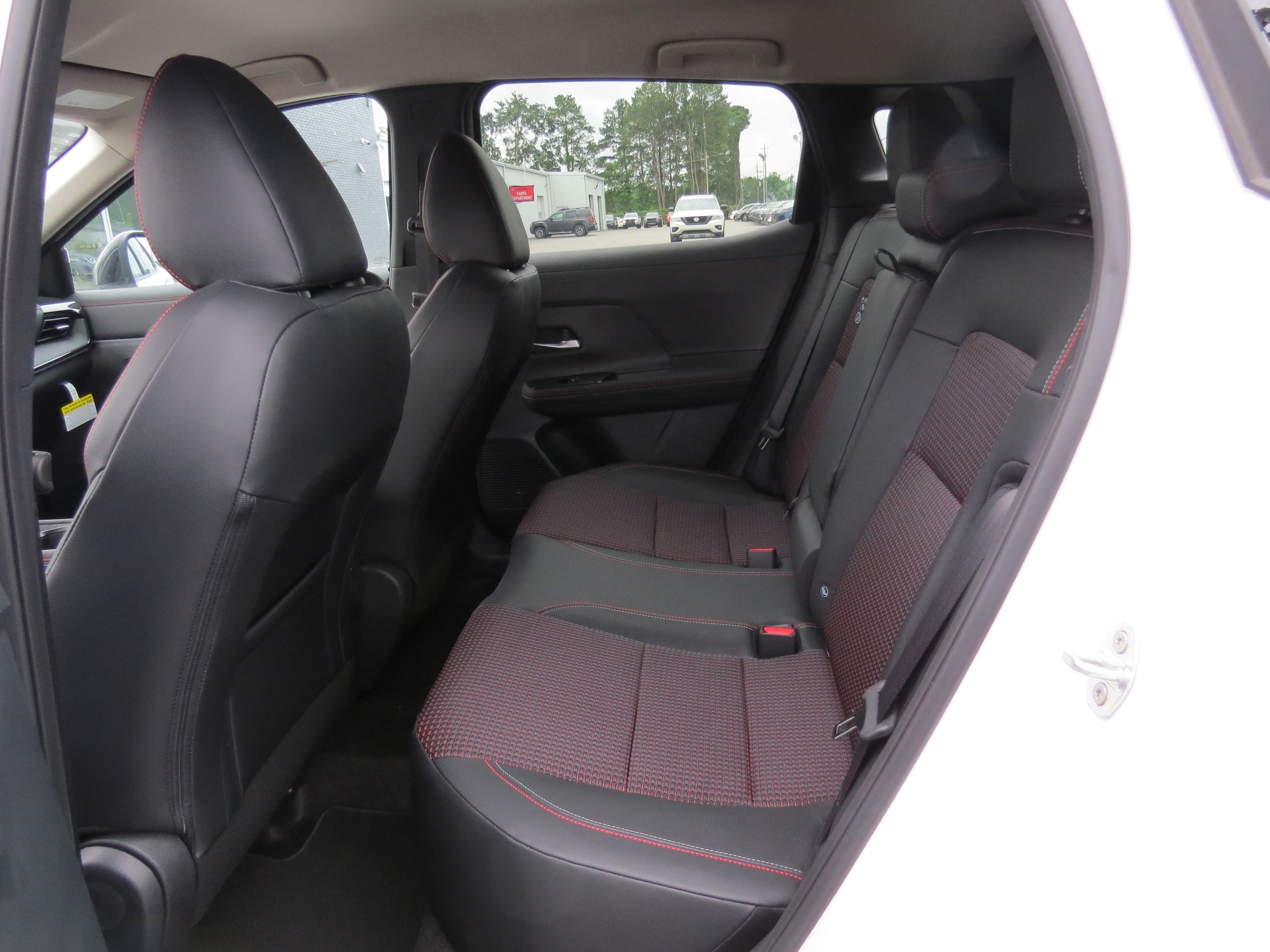 2025 Nissan Kicks SR Aspen White Tricoat/Super Black at Griffin Nissan