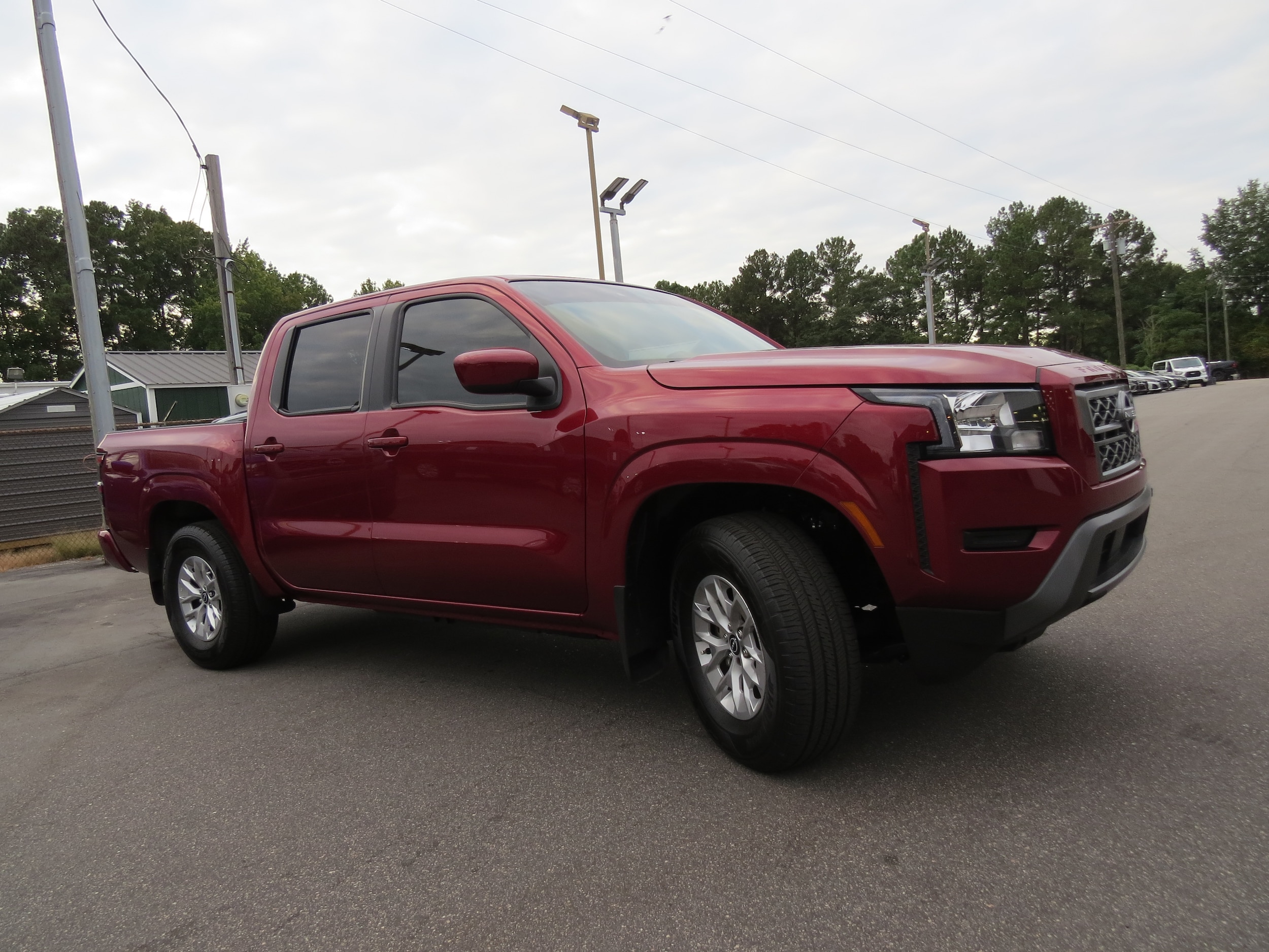 2024 Nissan Frontier SV Cardinal Red Metallic Tricoat at Griffin Nissan