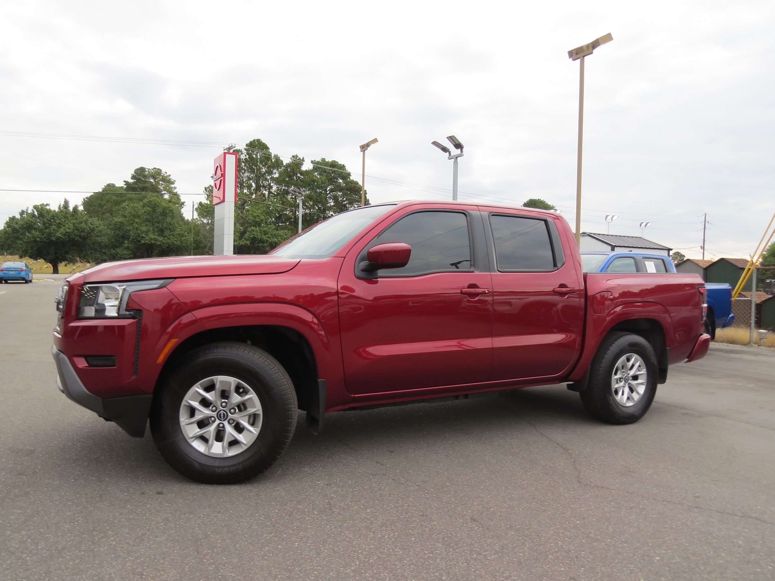 2024 Nissan Frontier SV Cardinal Red Metallic Tricoat at Griffin Nissan