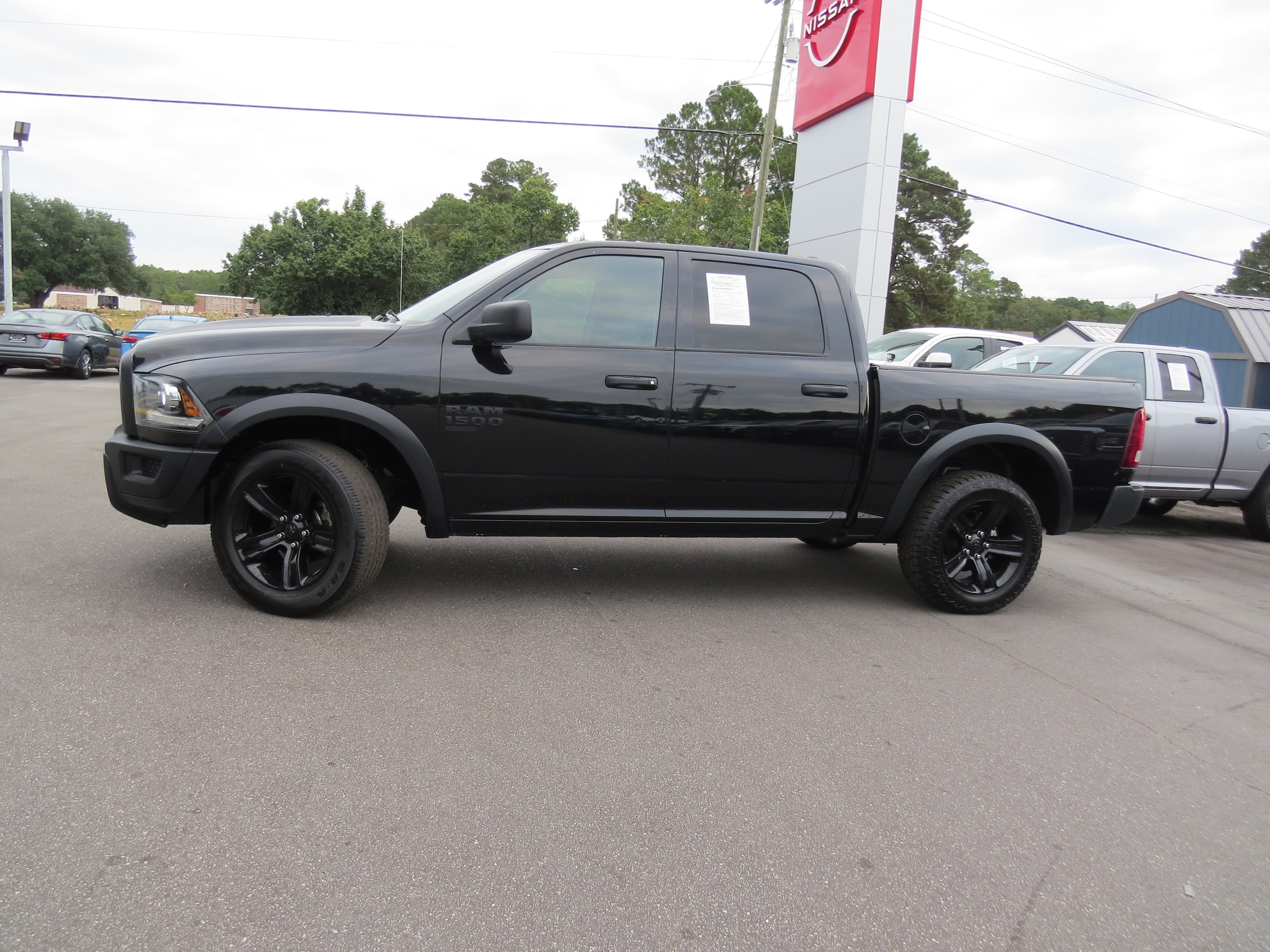 2024 Ram 1500 Classic Warlock Diamond Black Crystal Pearlcoat at Griffin Nissan