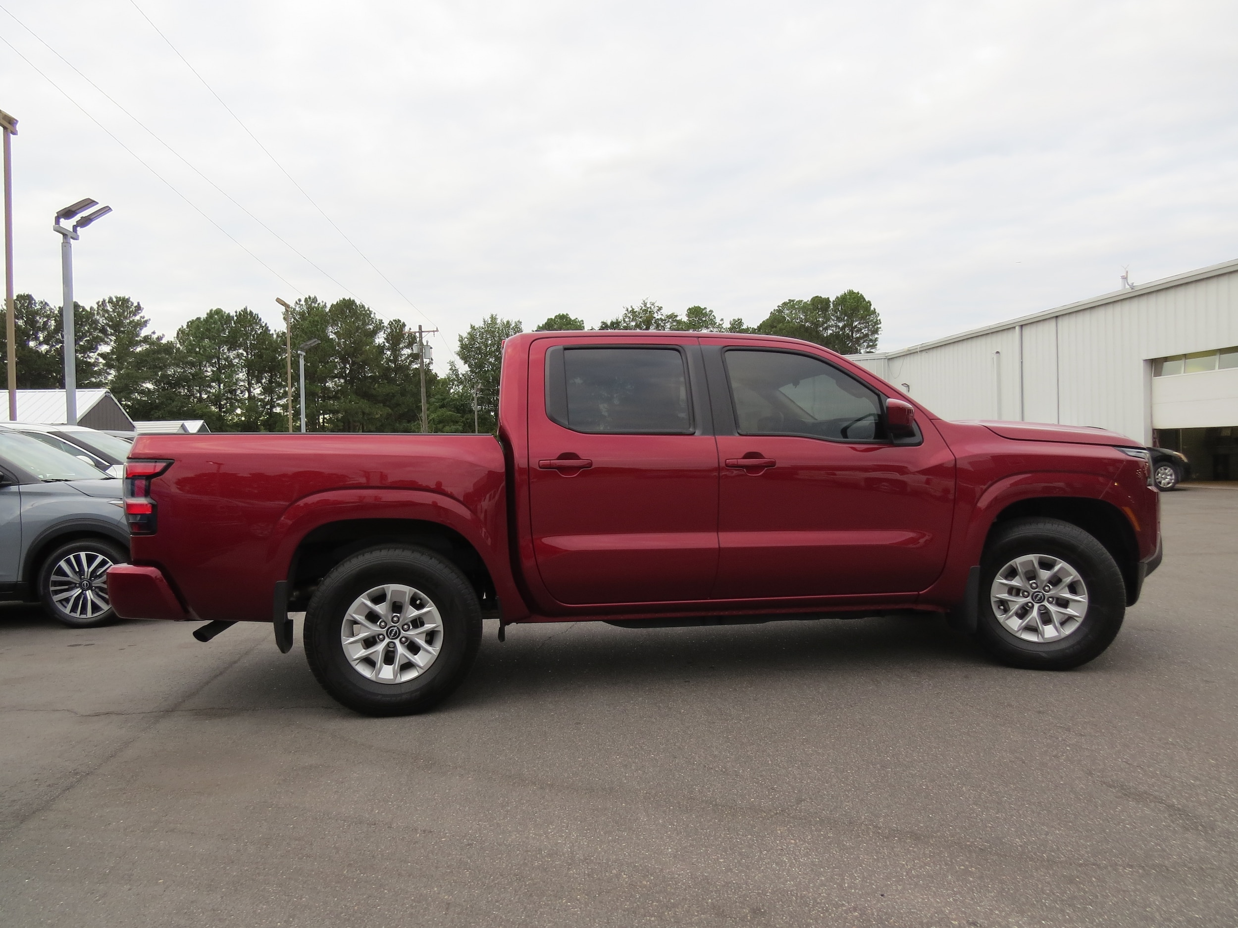 2024 Nissan Frontier SV Cardinal Red Metallic Tricoat at Griffin Nissan