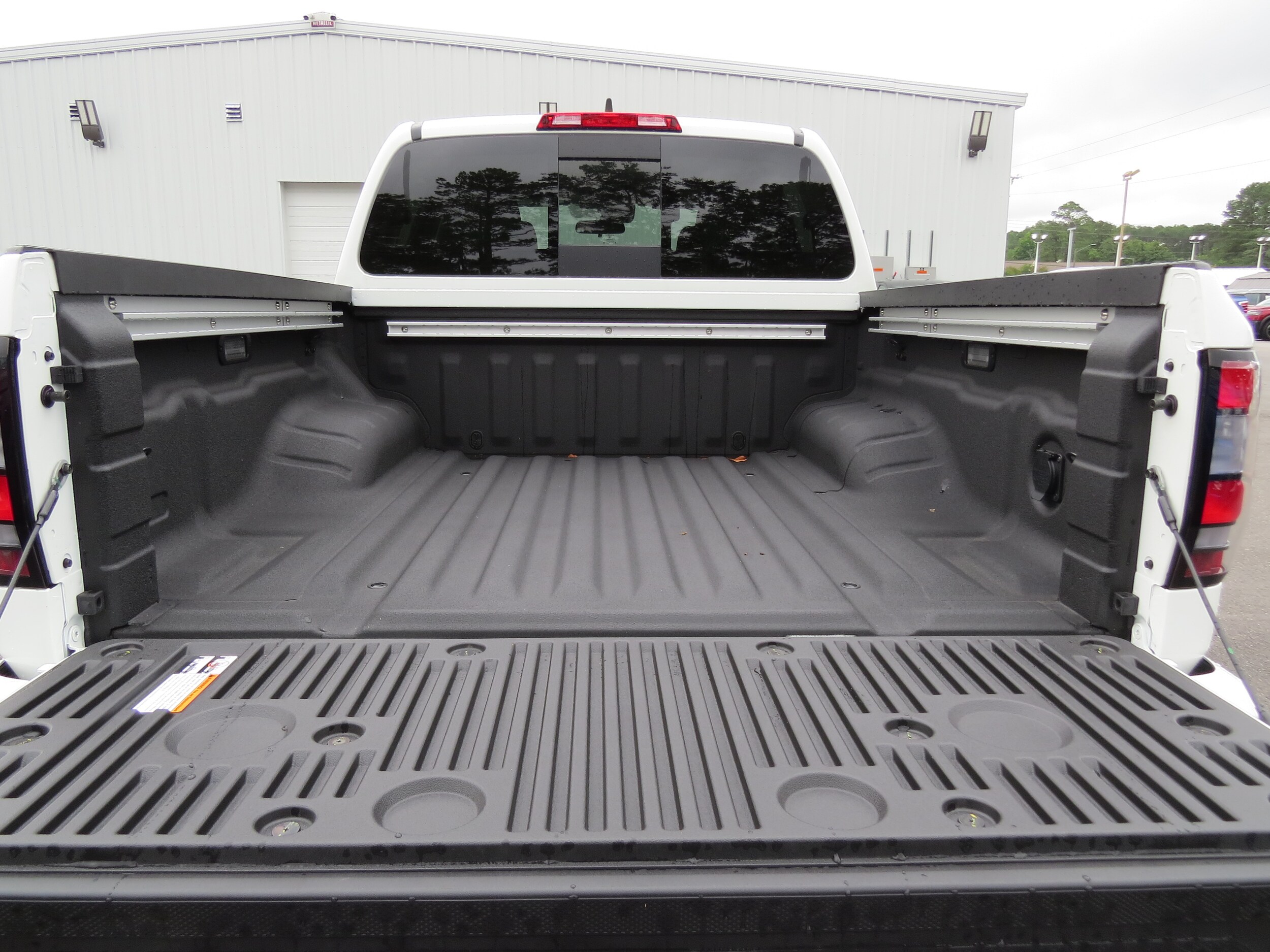 2025 Nissan Frontier SV Glacier White at Griffin Nissan