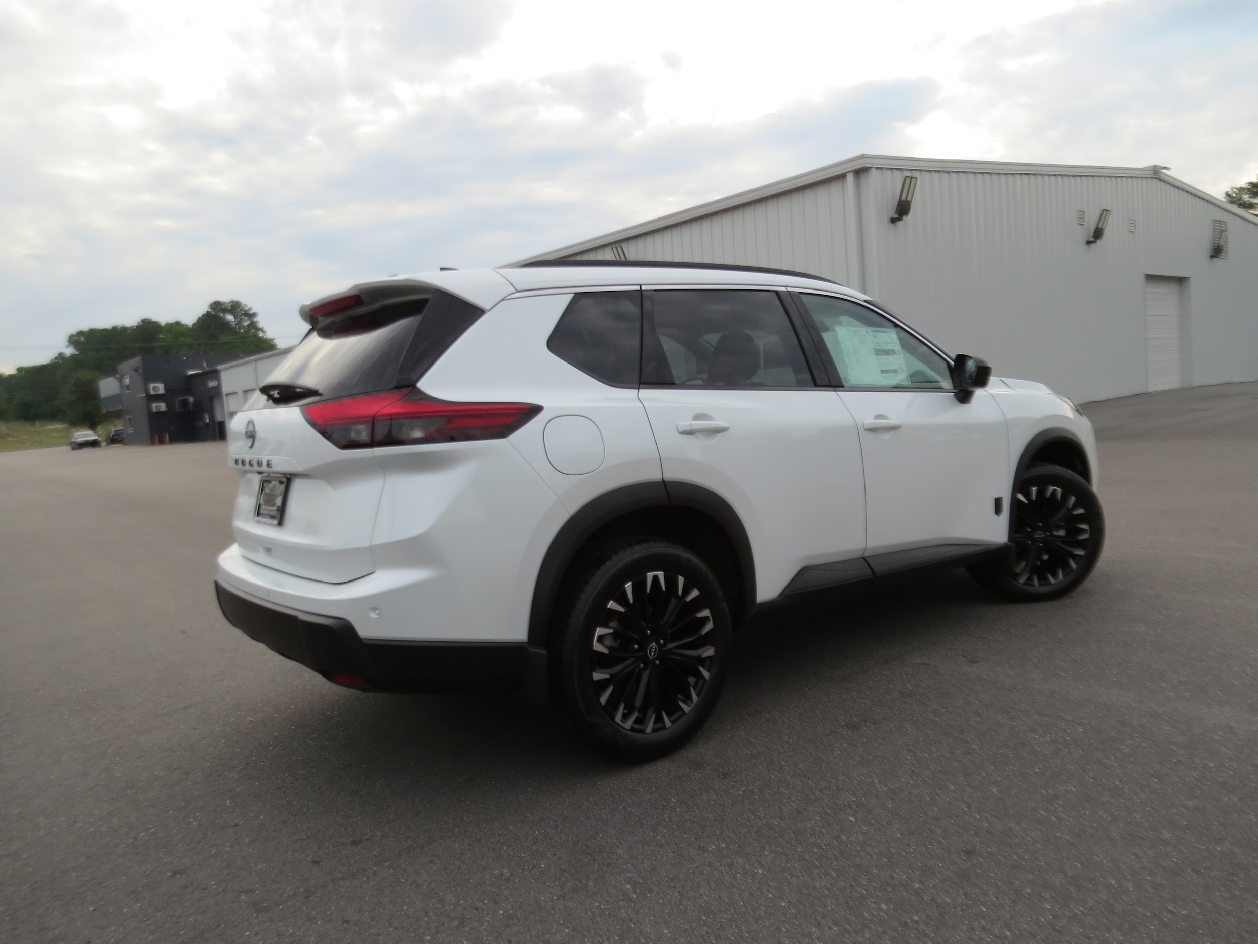2026 Nissan Rogue Dark Armor Everest White Pearl Tricoat at Griffin Nissan