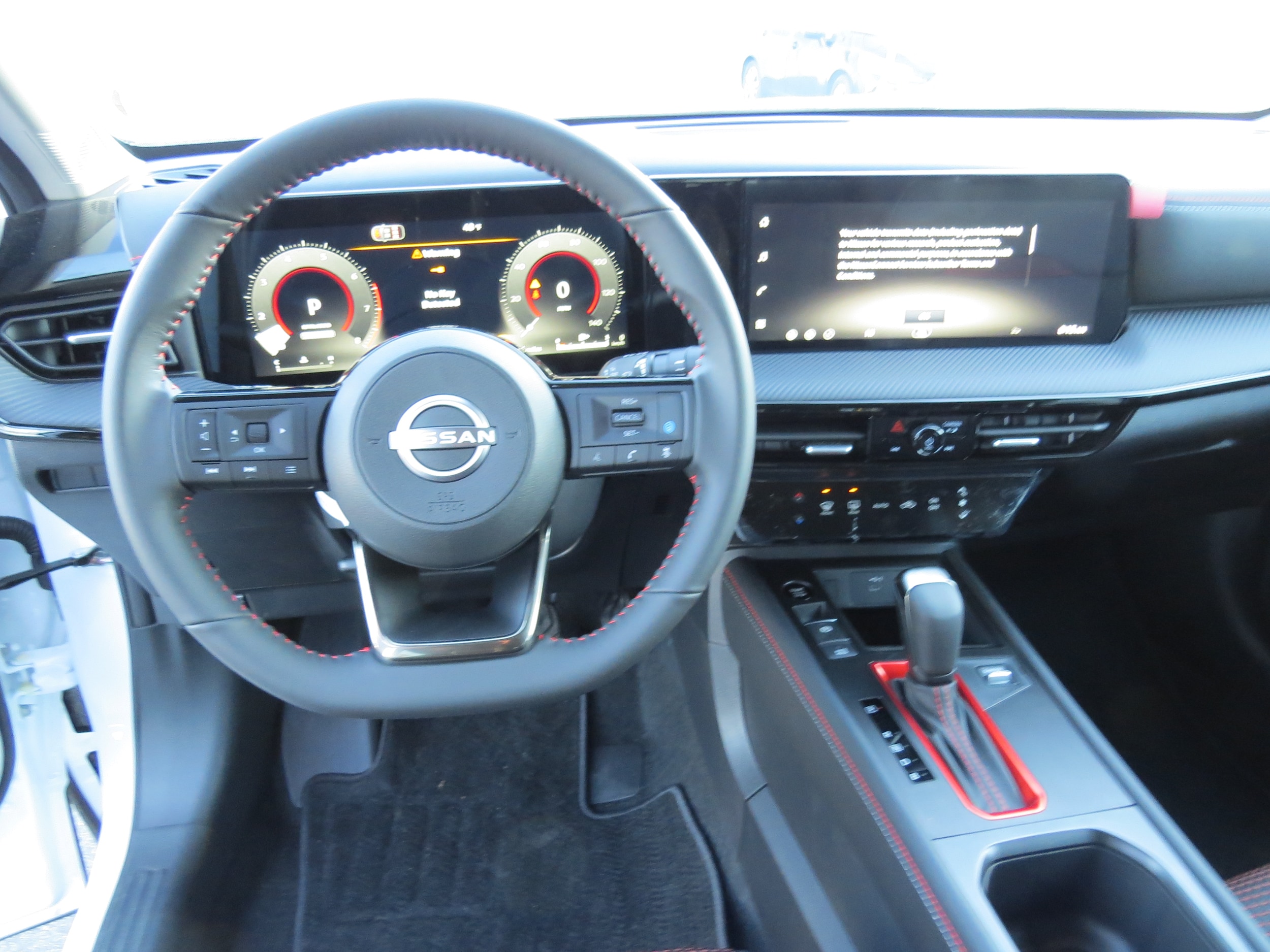 2026 Nissan Kicks SR Aspen White Tricoat/Super Black at Griffin Nissan