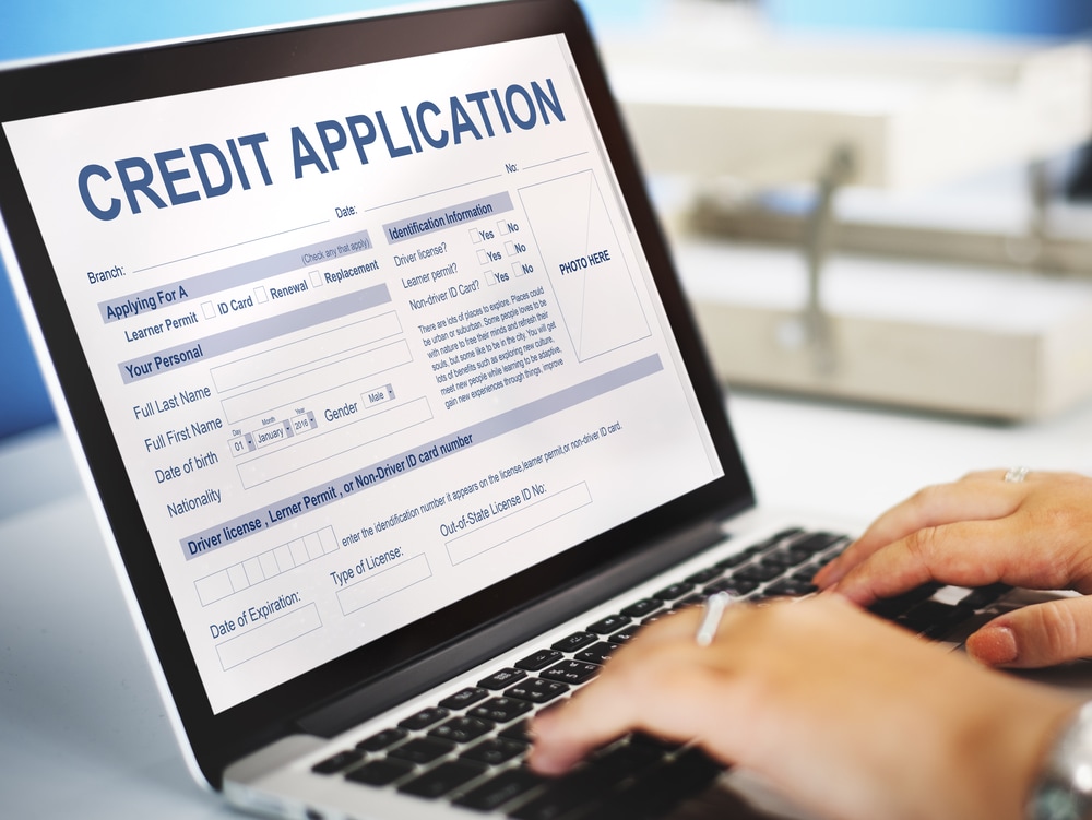 Jeep customer filling out Credit Application online on a laptop