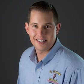 Staff member Travis Romano from 229679a892c8