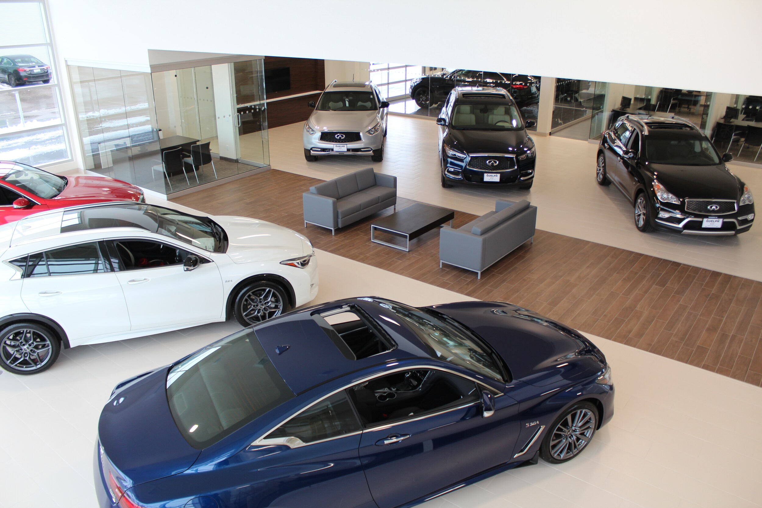 Guelph Infiniti - As you walk through a mirrored hallway, the impressive line of Infiniti vehicles are displayed as the peices of art they are