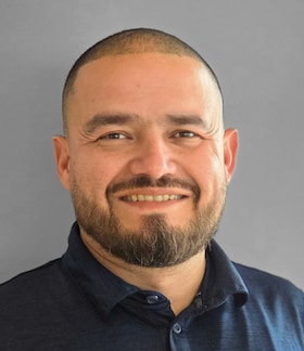 Staff member Mario Gonzalez from ID_bfbdb413d277