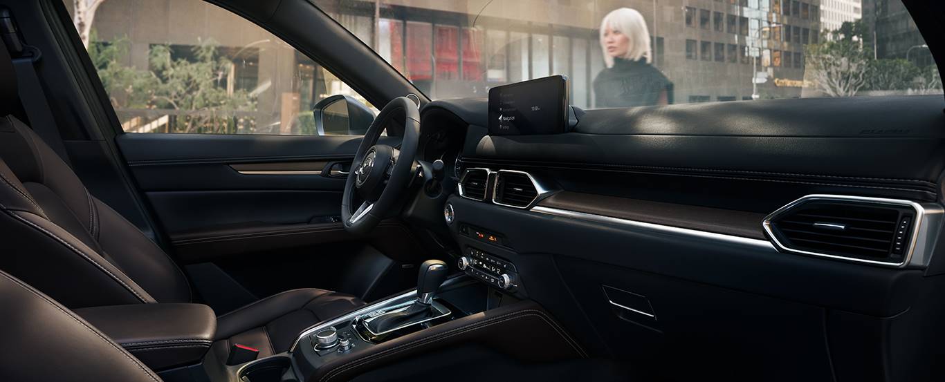 2024-mazda-cx-5-curated-front-cabin-space.jpg