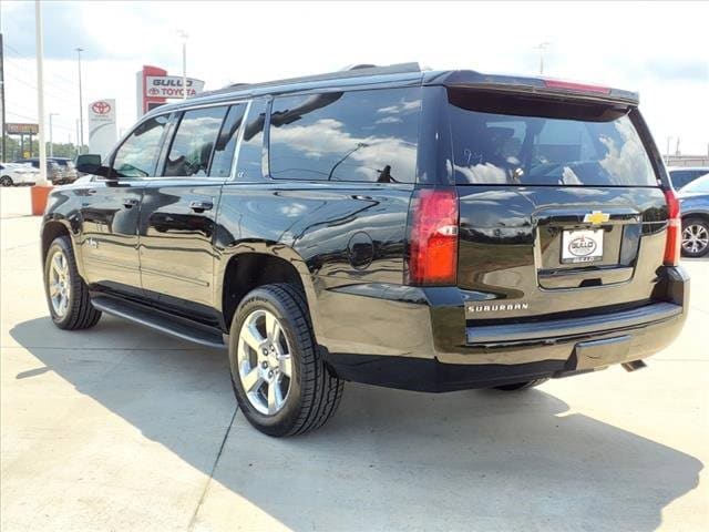 Used 2020 Chevrolet Suburban LT with VIN 1GNSCHKC3LR261085 for sale in Conroe, TX