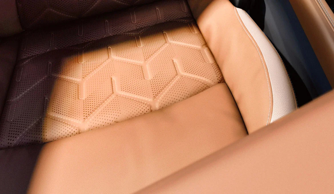 Nissan Pathfinder cabin shown from the rear hatch with brown leather seating across all three rows