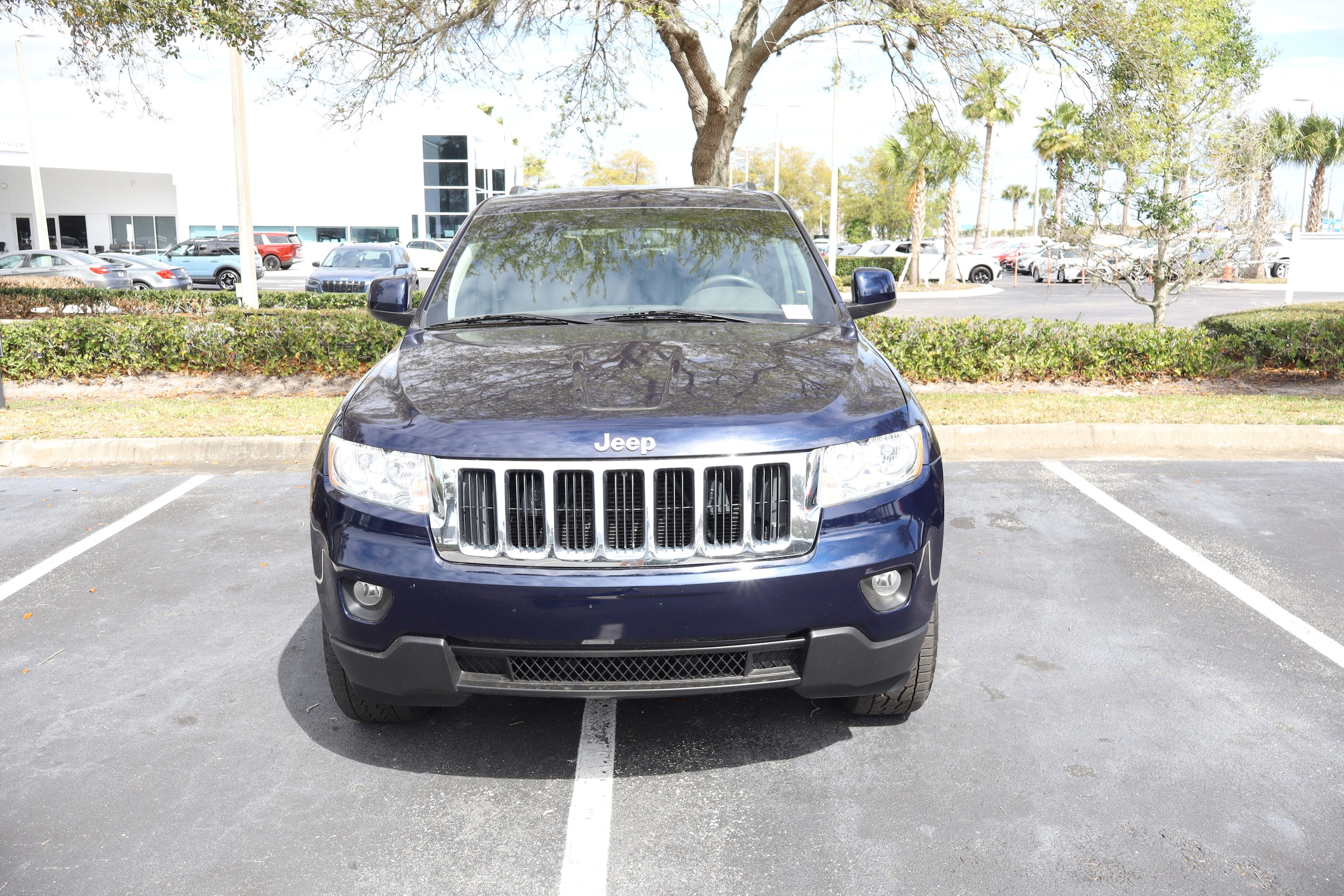 Used 2012 Jeep Grand Cherokee Laredo with VIN 1C4RJEAG0CC212347 for sale in Daytona Beach, FL