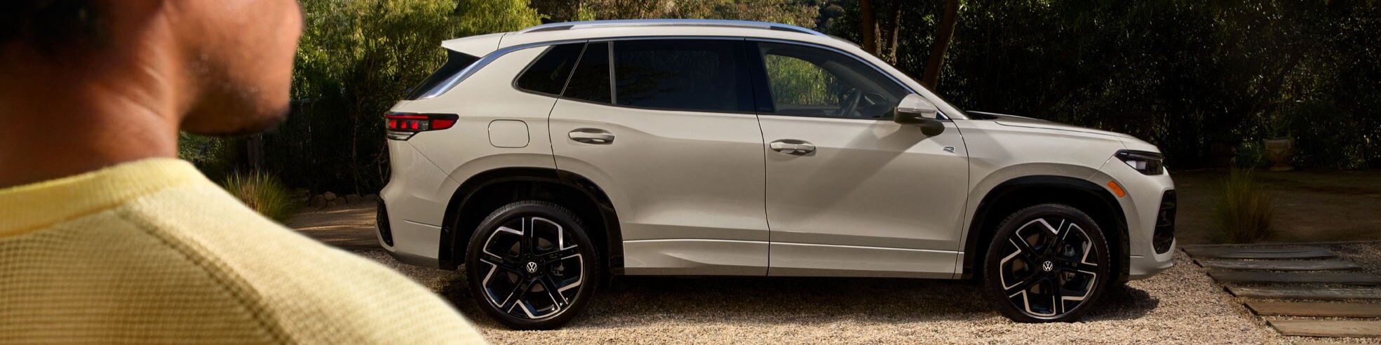 New 2025 Volkswagen Tiguan in a dynamic pose available for lease at Gunther VW Clermont