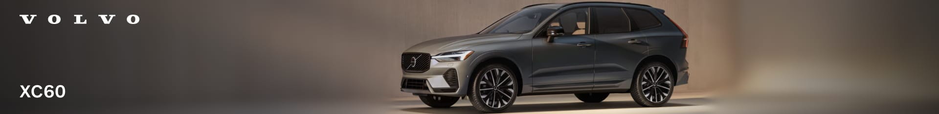 Volvo XC60 in gray shown from a front three-quarter view.