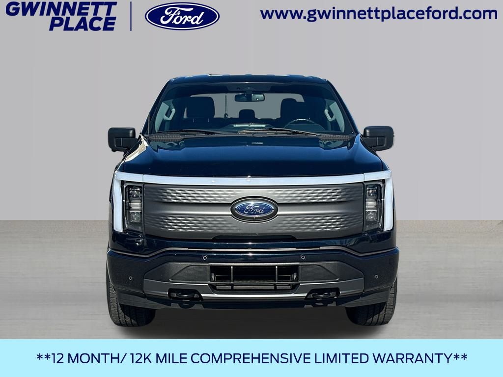 Certified 2023 Ford F-150 Lightning XLT with VIN 1FT6W1EV8PWG27037 for sale in Duluth, GA