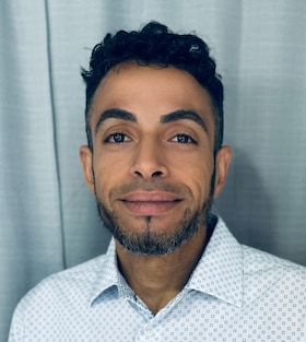 Staff member Gustavo Adorno from 370a81a624a1