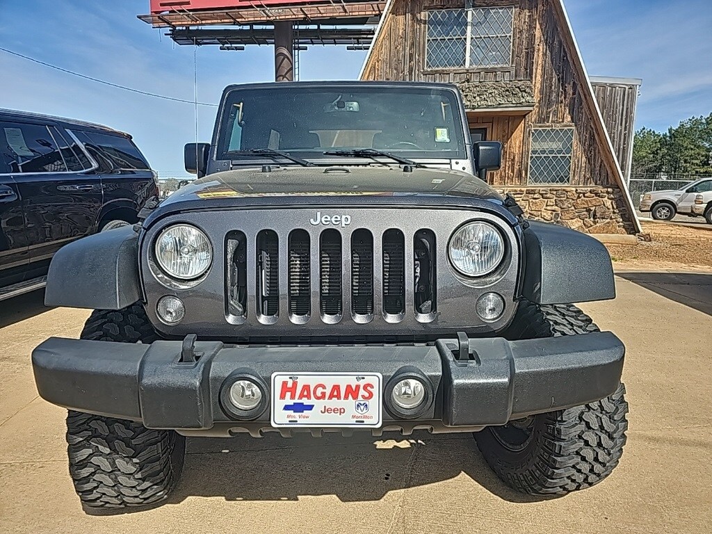 Certified 2018 Jeep Wrangler JK Unlimited Sport S with VIN 1C4BJWDG7JL875849 for sale in Morrilton, AR