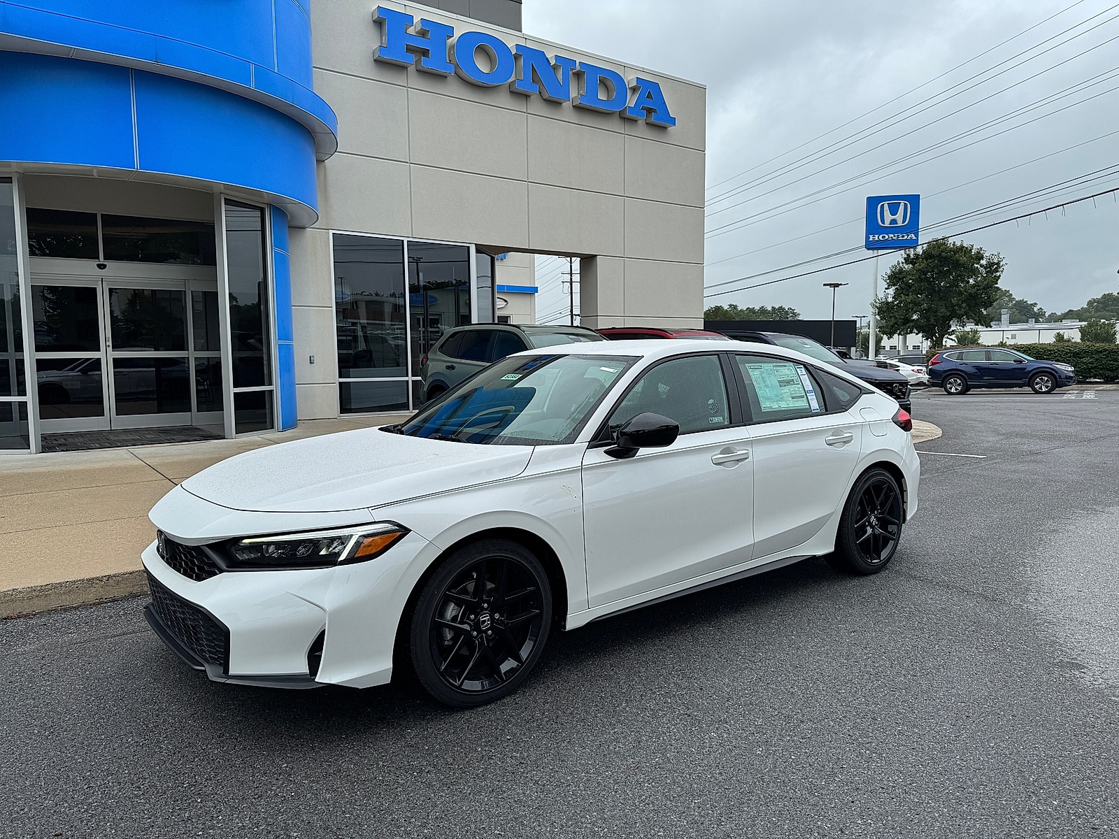 2026 Honda Civic Sport CVT's photo