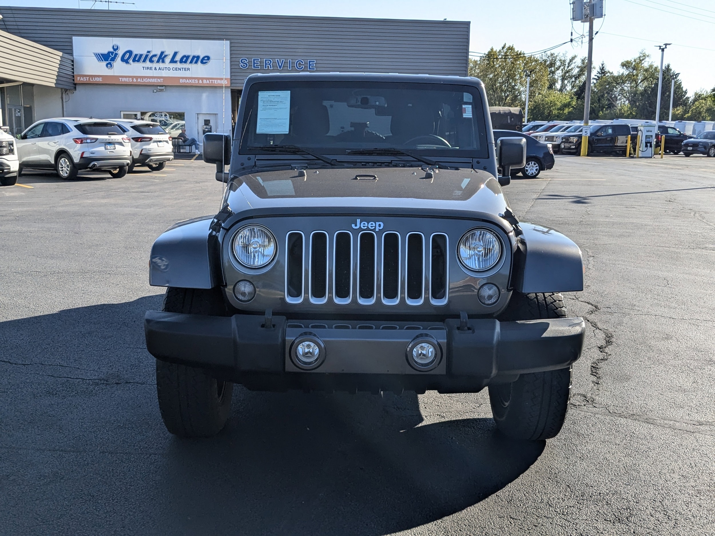 Used 2016 Jeep Wrangler Unlimited Sahara with VIN 1C4BJWEG7GL349115 for sale in West Chicago, IL