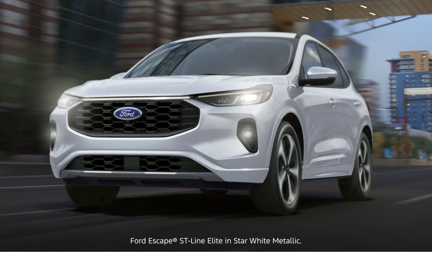 Three-quarter front view of a white Ford Escape ST-Line Elite driving along a blurred city street.
