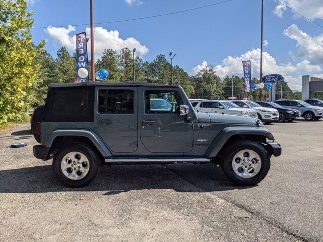 Used 2014 Jeep Wrangler Unlimited Sahara with VIN 1C4BJWEG6EL121118 for sale in Farmville, VA