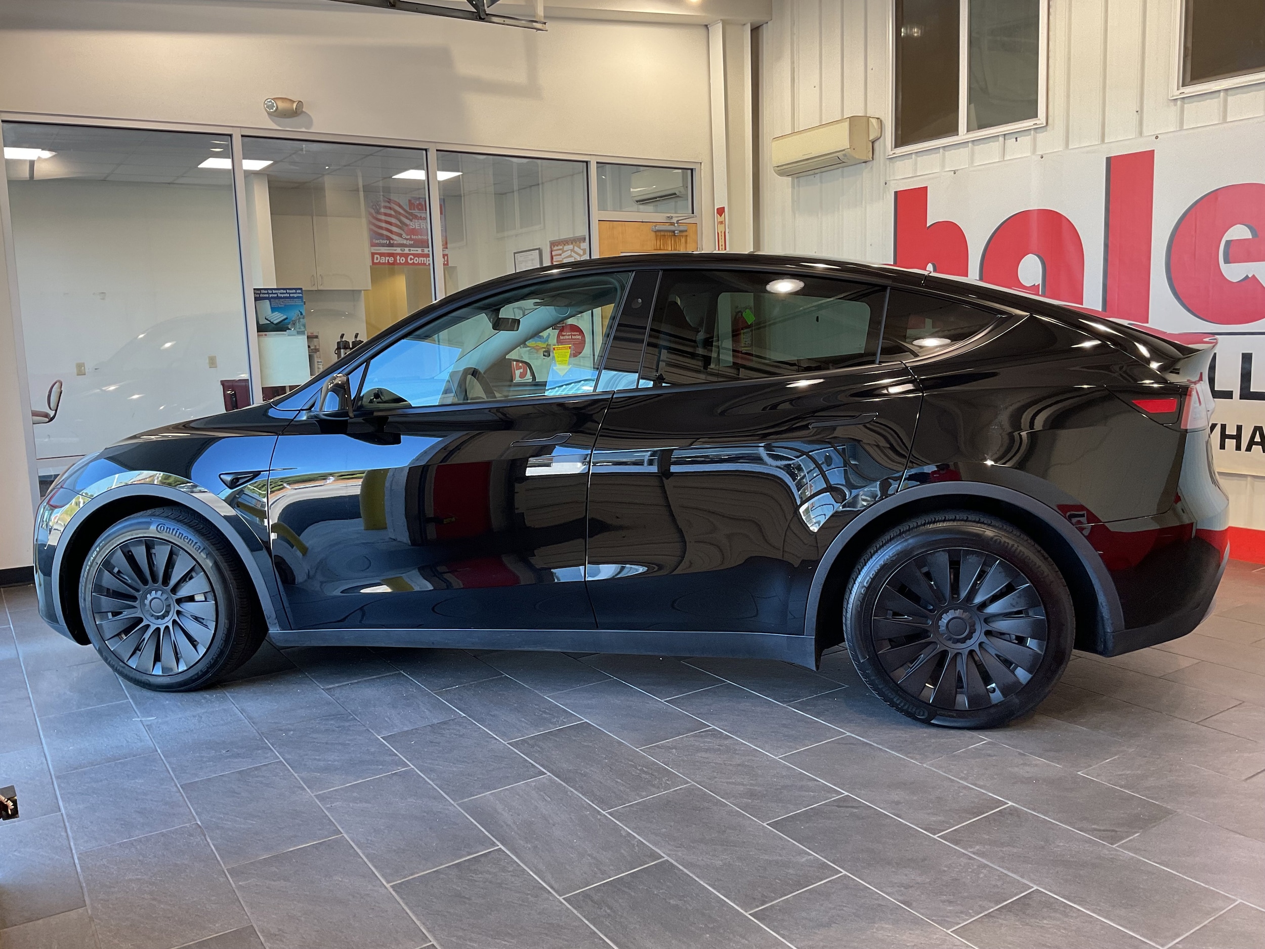 Used 2024 Tesla Model Y Long Range with VIN 7SAYGAEE7RF089771 for sale in Farmville, VA