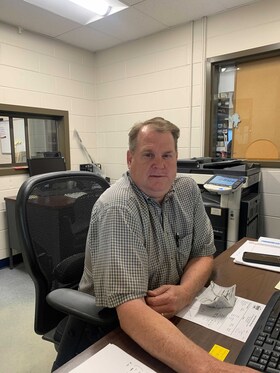 Staff member DAVID ADAMS from 64215ea910d8