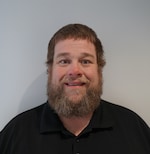 Staff member TJ Pinson from ID_8d251f
