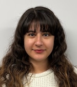 Staff member Sera Tok from ID_2b79a61a2979