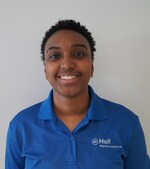 Staff member Kam Cruz from ID_402184