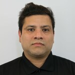 Staff member Fernando Morales from ID_66b8d0e3b4f5