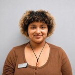 Staff member Mikiah Caro from ID_3c978383dc73