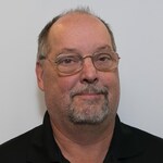Staff member Michael Titus from ID_66b8d0e3b4f5
