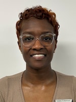 Staff member Tanisha Parkinson from ID_2b79a61a2979