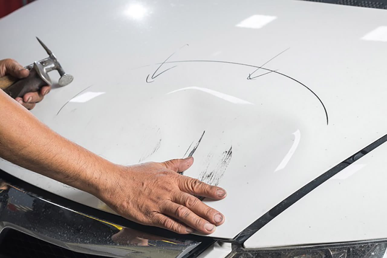 Dent_On_Top_Of_Car.jpg