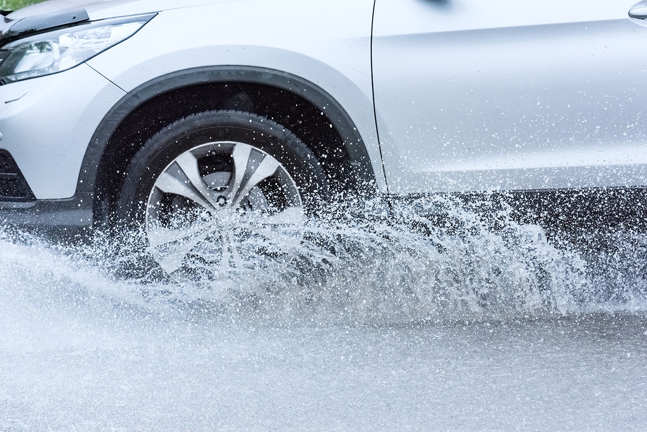 Car%20Driving%20Through%20Deep%20Puddle.jpg