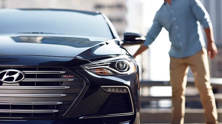 Hyundai-Elantra-man-opening-door.jpg
