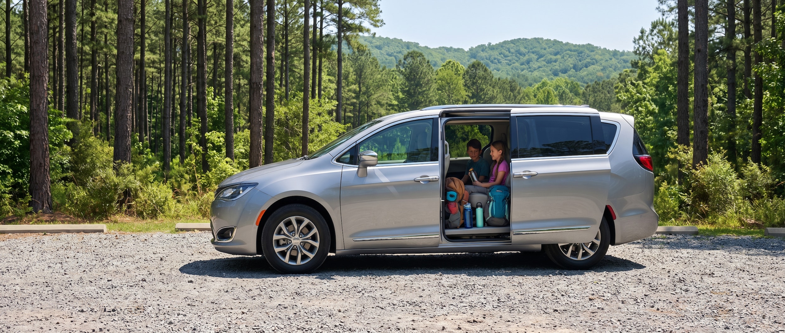 2026 Chrysler Pacifica at an Alabama state park trailhead on a summer family road trip