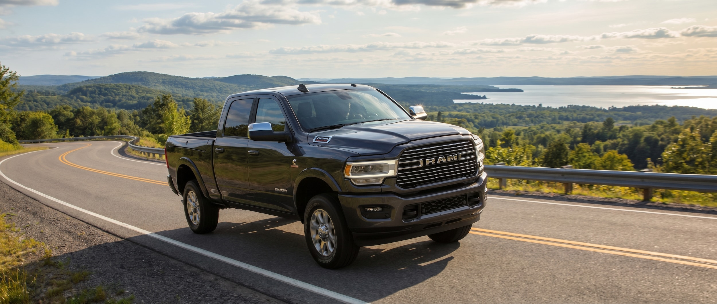 RAM 2500 towing travel trailer through Alabama landscape near Birmingham AL