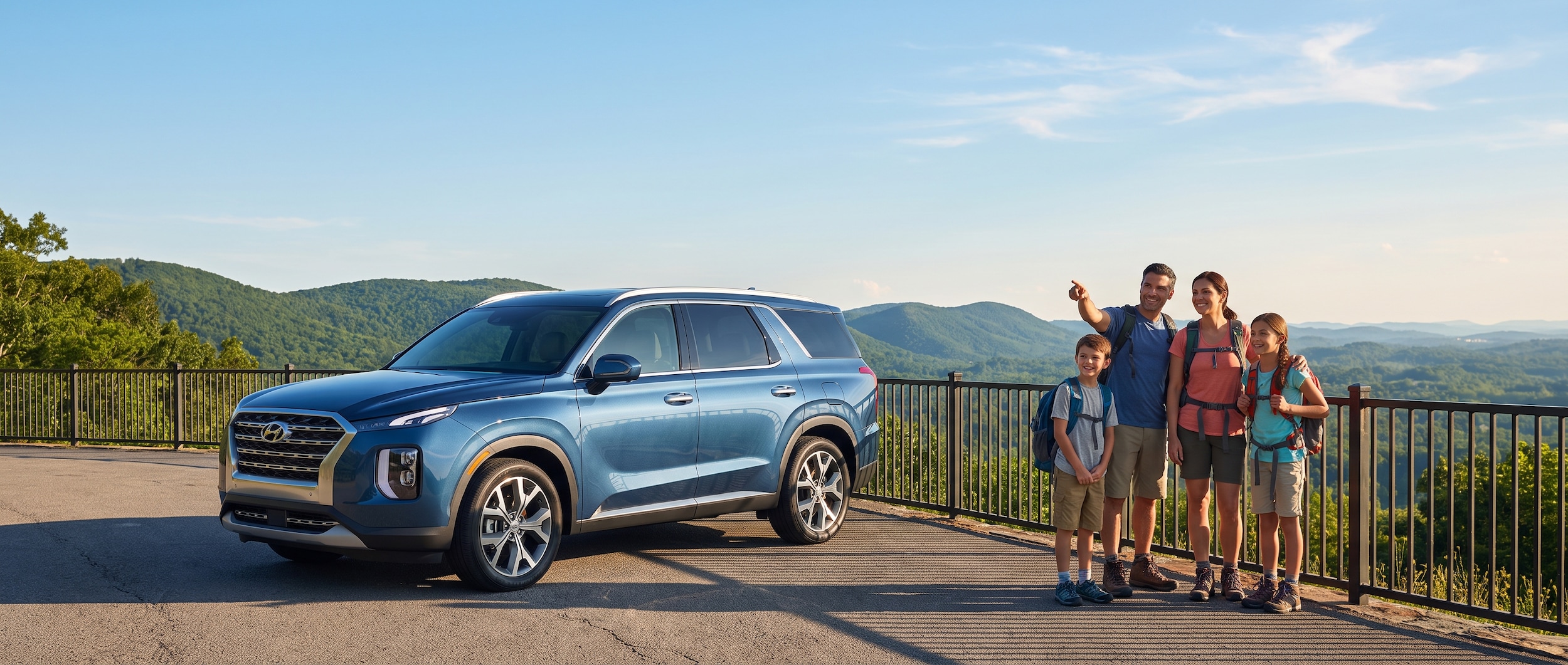 A bright summer day in Birmingham, Alabama, with a modern Hyundai SUV parked near a scenic overlook with green hills and blue sky in the background, conveying warm-weather adventure and family confidence.
