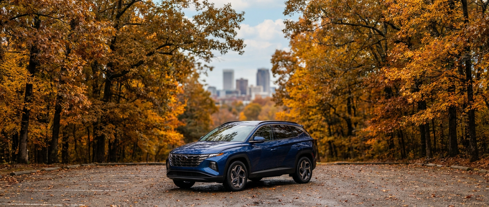 2026 Hyundai Tucson parked at Ruffner Mountain Nature Preserve in Birmingham, AL, fall foliage visible