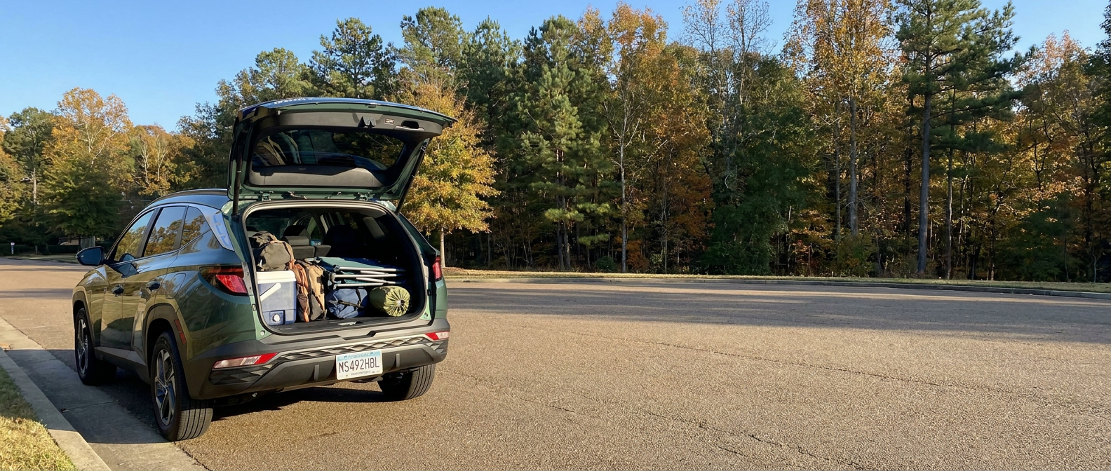 2026 Hyundai Tucson liftgate open with cargo loaded on a Ridgeland MS road near the Natchez Trace Parkway corridor